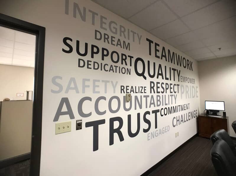 large custom vinyl lettering on office wall