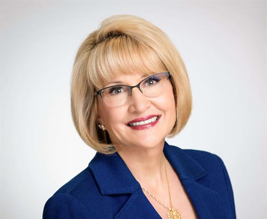 Headshot of Catherine Monson, CFE